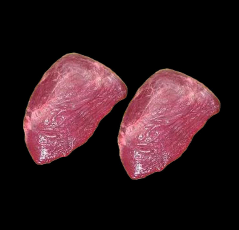 طحال خروف مخلوط مع العظم، مقطوع إلى قطع صغيرة، مع صلصة خفيفة على الجانب